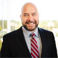 TOM G. DELANEY